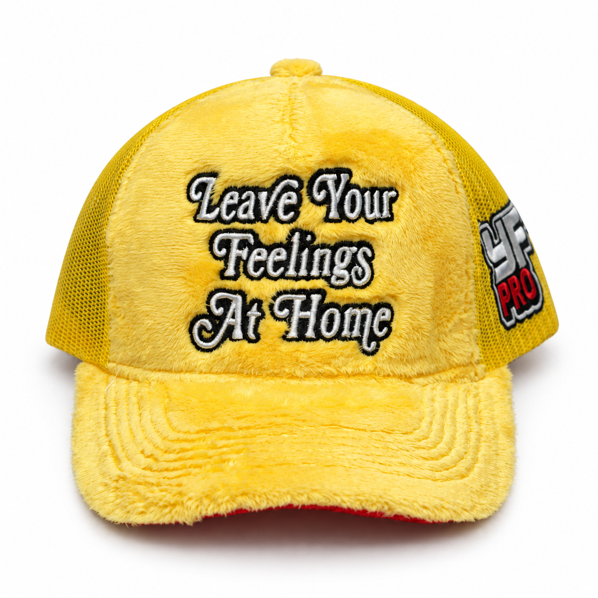 Front view of yellow LYFAH plush trucker hat with Leave Your Feelings At Home embroidery and red underbrim.